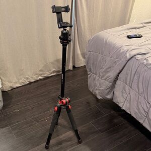 Versatile Black Tripod for Cameras and Smartphones